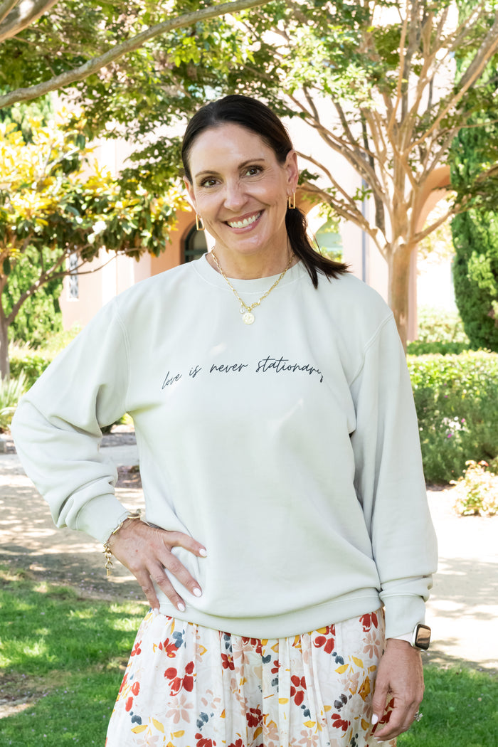 Love Is Never Stationary Crewneck