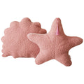 Set of 2 boucle cushions, one star shaped and one shell shaped in rose pink
