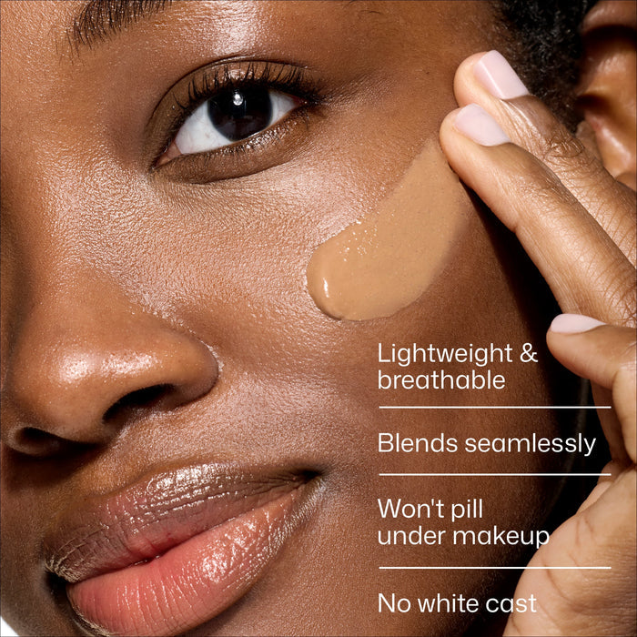 Close-up of a woman applying makeup with text highlighting product features.