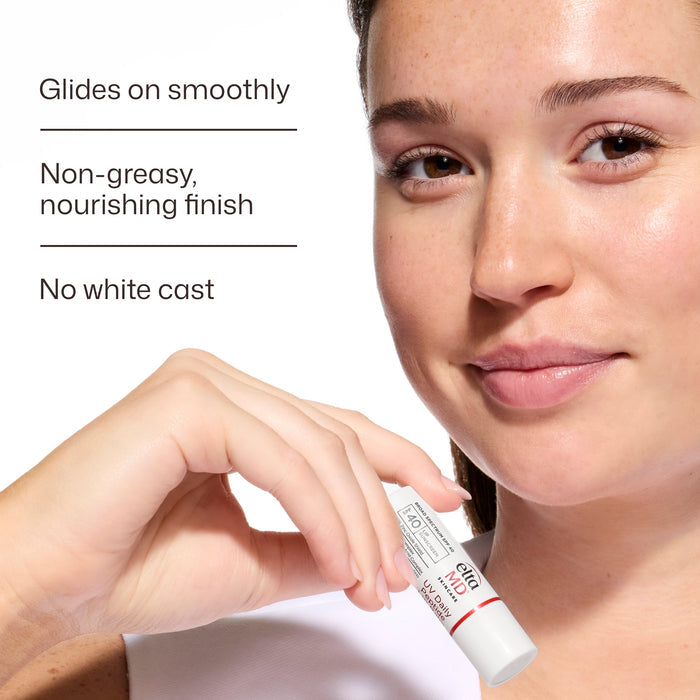 Woman holding a cosmetic product with text about its smooth application and finish.