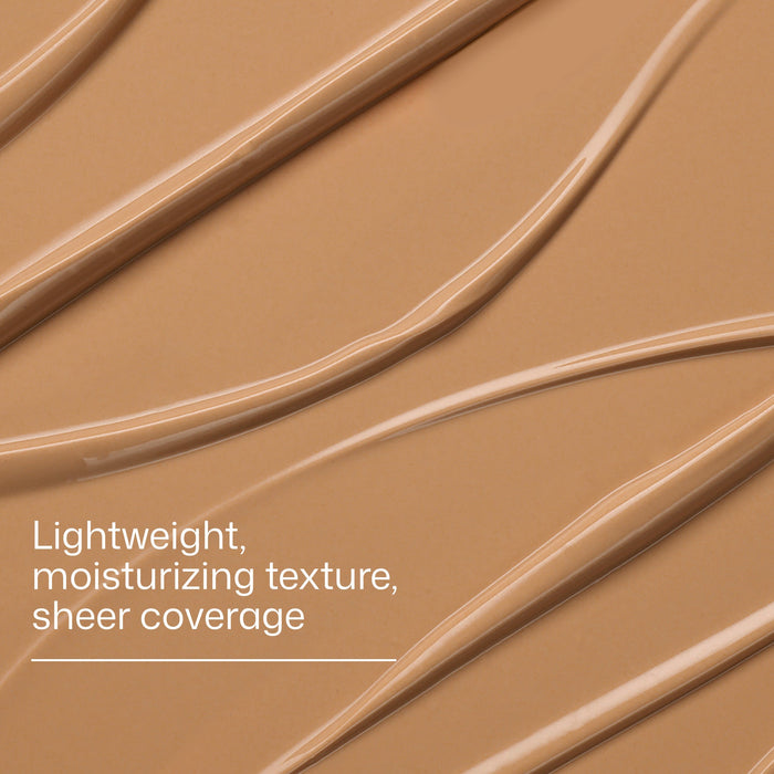 Brown makeup swatch with text describing texture and coverage