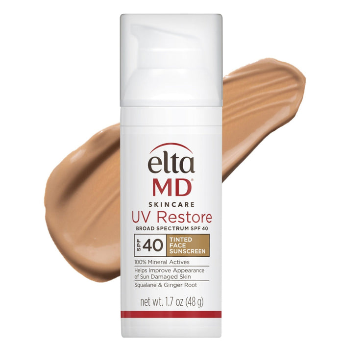 Elta MD UV Restore sunscreen bottle with a swatch of tan color on a white background
